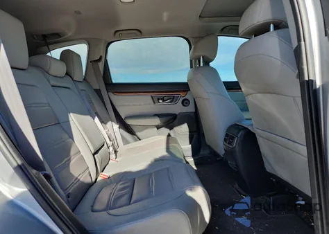 2021 Honda Cr-V Touring z USA, uszkodzony, nr VIN 7FART6H94ME032952